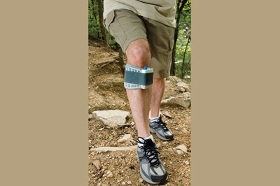 Man hiking wearing his WalkAide - unit available at Sunshine Prosthetics and Orthotics in northern NJ